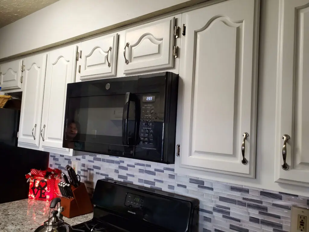 lemon-after White kitchen cabinets painted by A Women's Brush