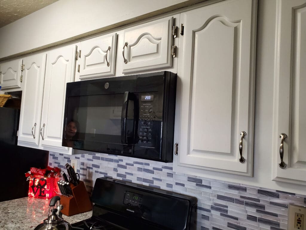 lemon-after White kitchen cabinets painted by A Women's Brush